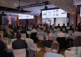 Alan Milne speaks to the attendees at World of Modular Europe in 2025